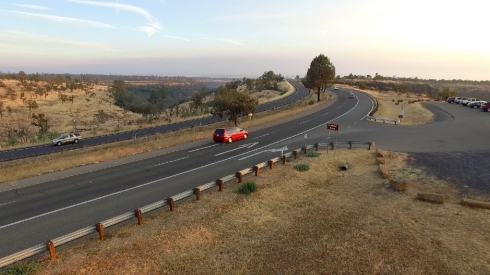 Taking off over a highway on the ridge